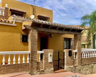 Exterior view of House or chalet for sale in Málaga Capital  with Air Conditioner and Terrace