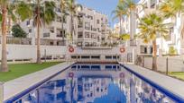 Swimming pool of Flat for sale in Salobreña  with Air Conditioner, Terrace and Swimming Pool