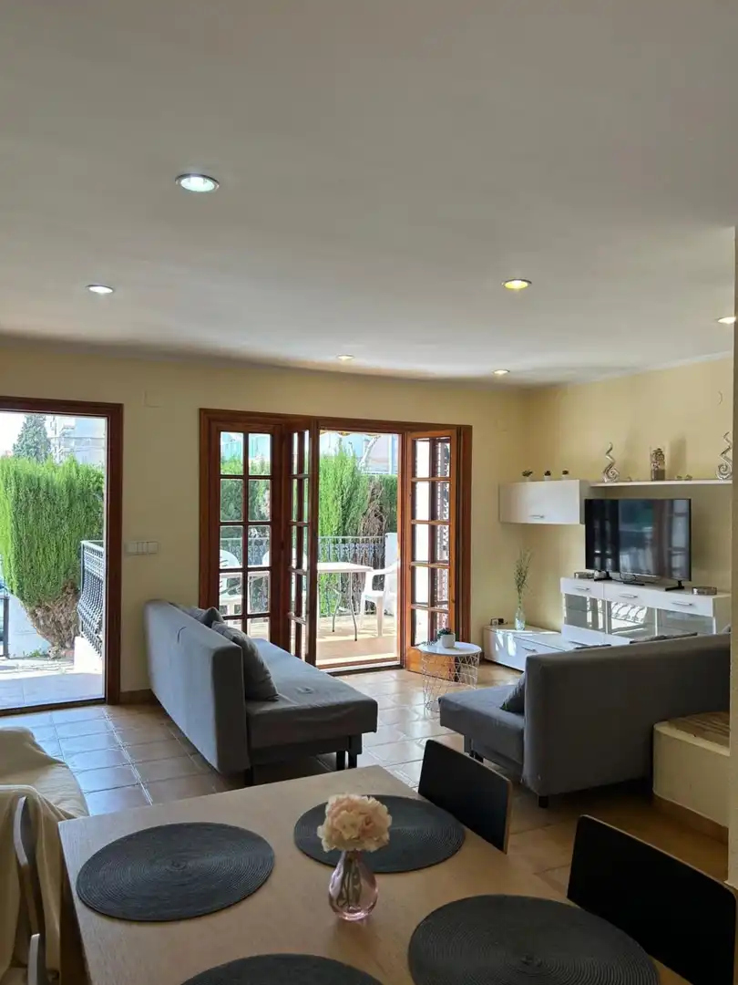 Sala de estar de Casa o chalet de alquiler en La Pobla de Farnals con Aire acondicionado, Terraza y Piscina