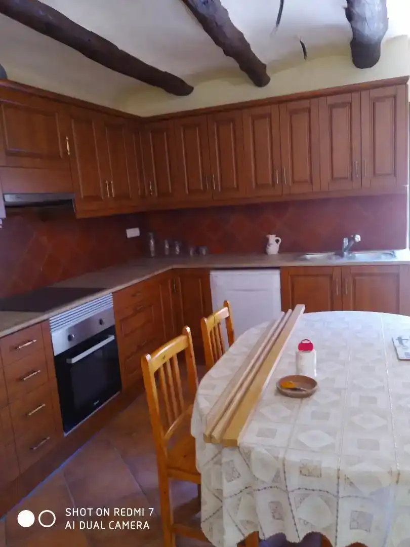 Cuina de Casa adosada en venda en Castellote amb Parquet, Traster i Moblat