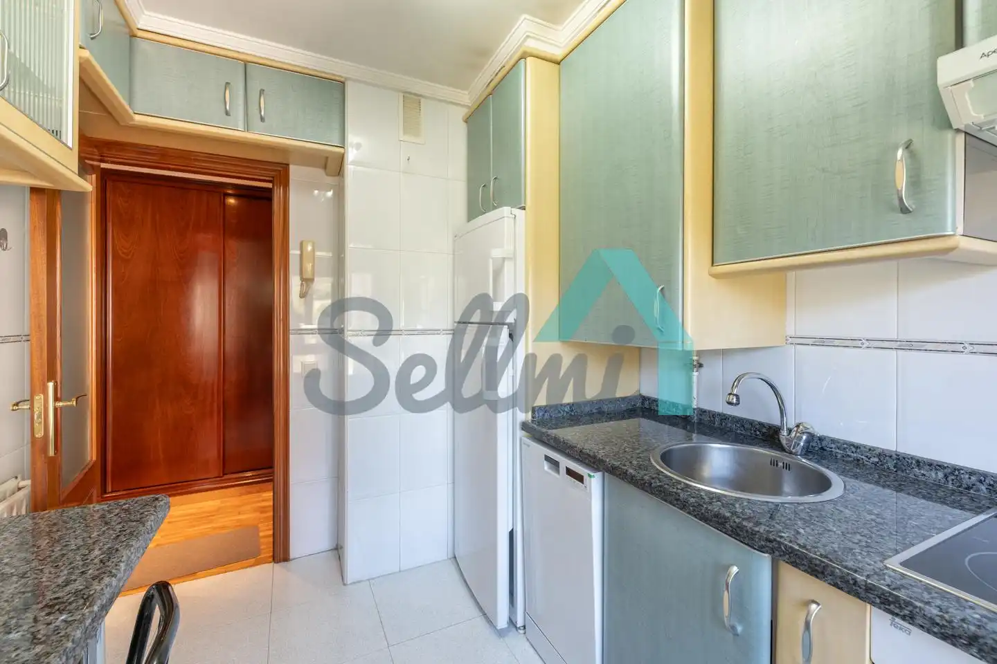 Kitchen of Flat for sale in Oviedo   with Heating, Parquet flooring and Storage room