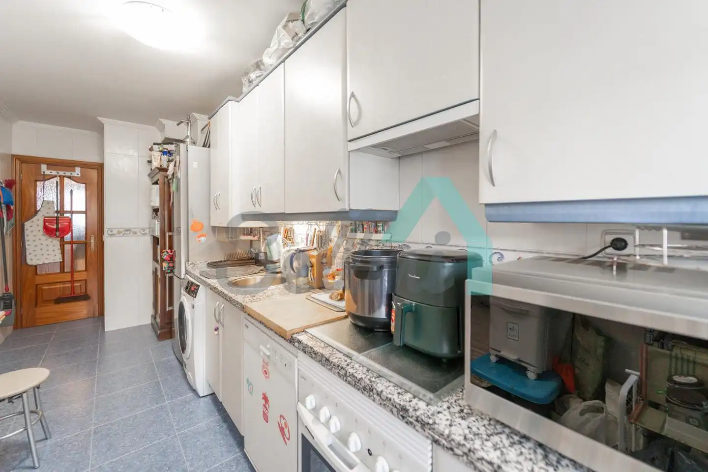 Kitchen of Flat for sale in Oviedo   with Heating, Parquet flooring and Storage room