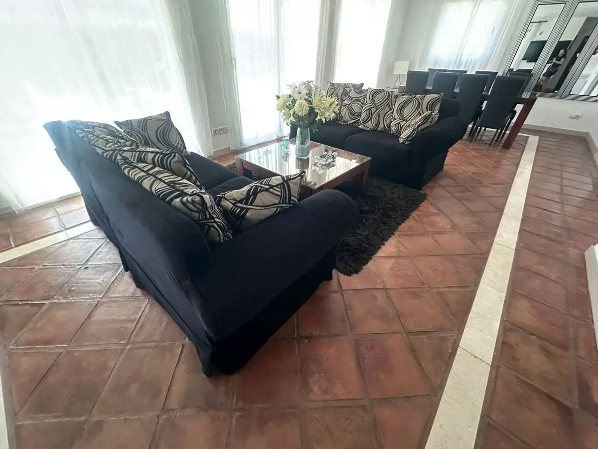 Sala de estar de Casa o chalet en venta en Manilva con Aire acondicionado, Jardín privado y Terraza