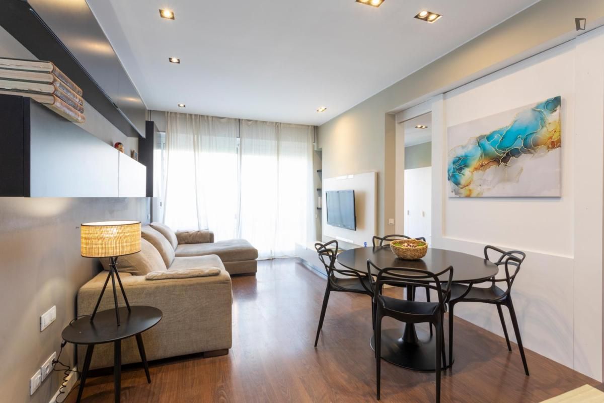 Sala d'estar de Apartament de lloguer en  Barcelona Capital amb Aire condicionat, Moblat i Forn