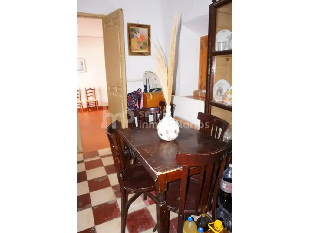 Comedor de Casa adosada en venta en Benamocarra con Jardín privado, Terraza y Amueblado