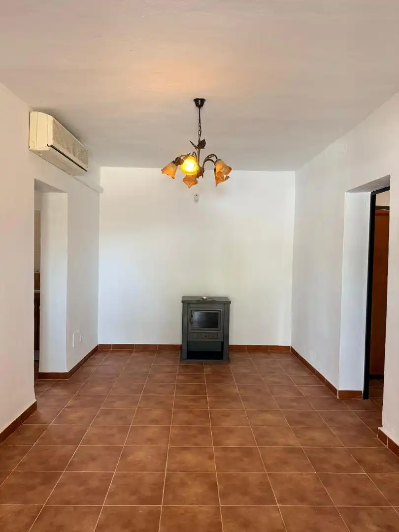Sala d'estar de Finca rústica en venda en Cártama amb Aire condicionat, Jardí privat i Traster