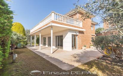 Exterior view of House or chalet for sale in Castelldefels  with Air Conditioner, Heating and Private garden