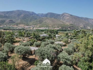 Casa rústica con jardín en venta en Órgiva