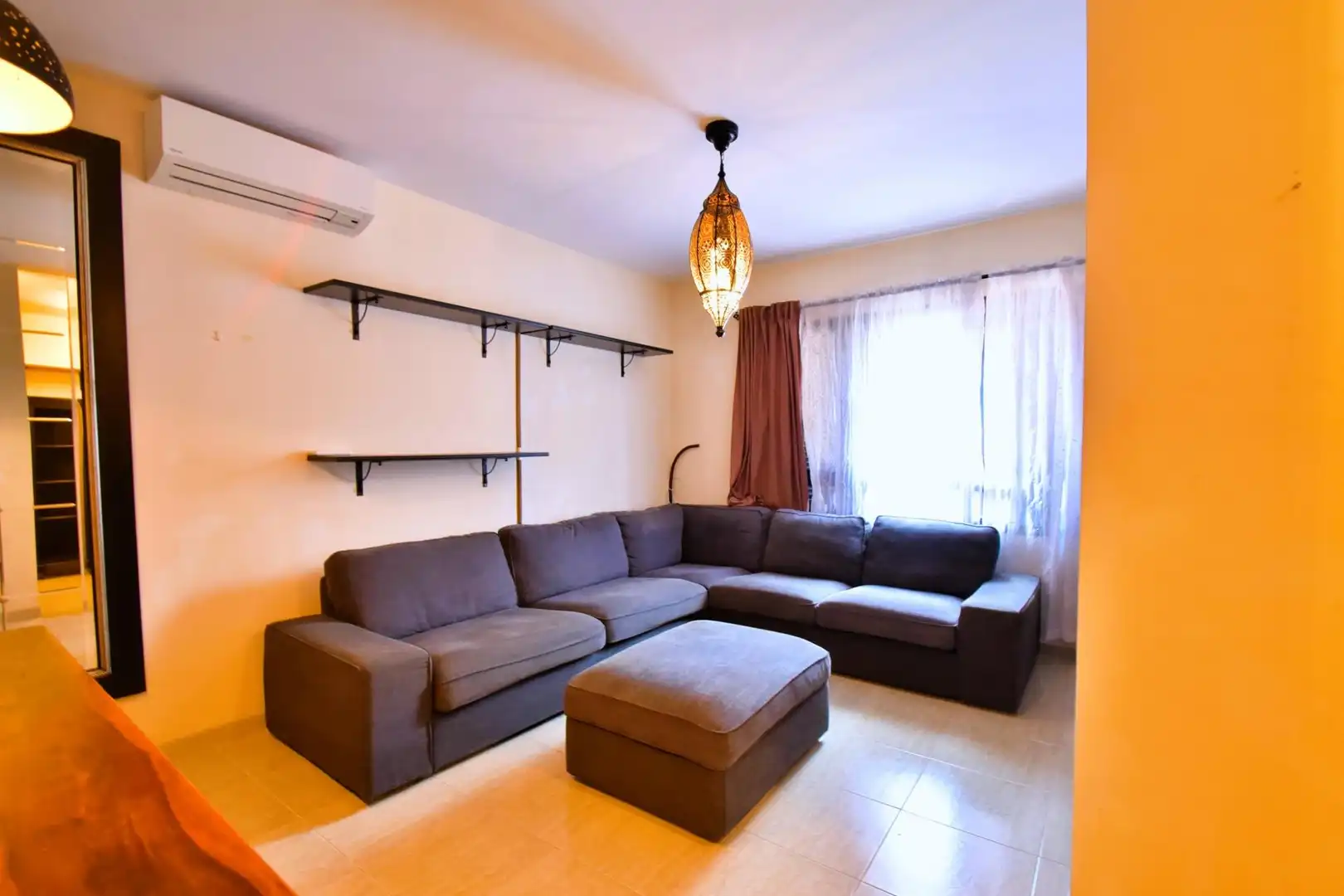 Sala de estar de Casa adosada de alquiler en San Cristóbal de la Laguna con Aire acondicionado, Calefacción y Jardín privado