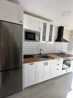 Cuina de Apartament en venda en León Capital  amb Calefacció, Parquet i Terrassa