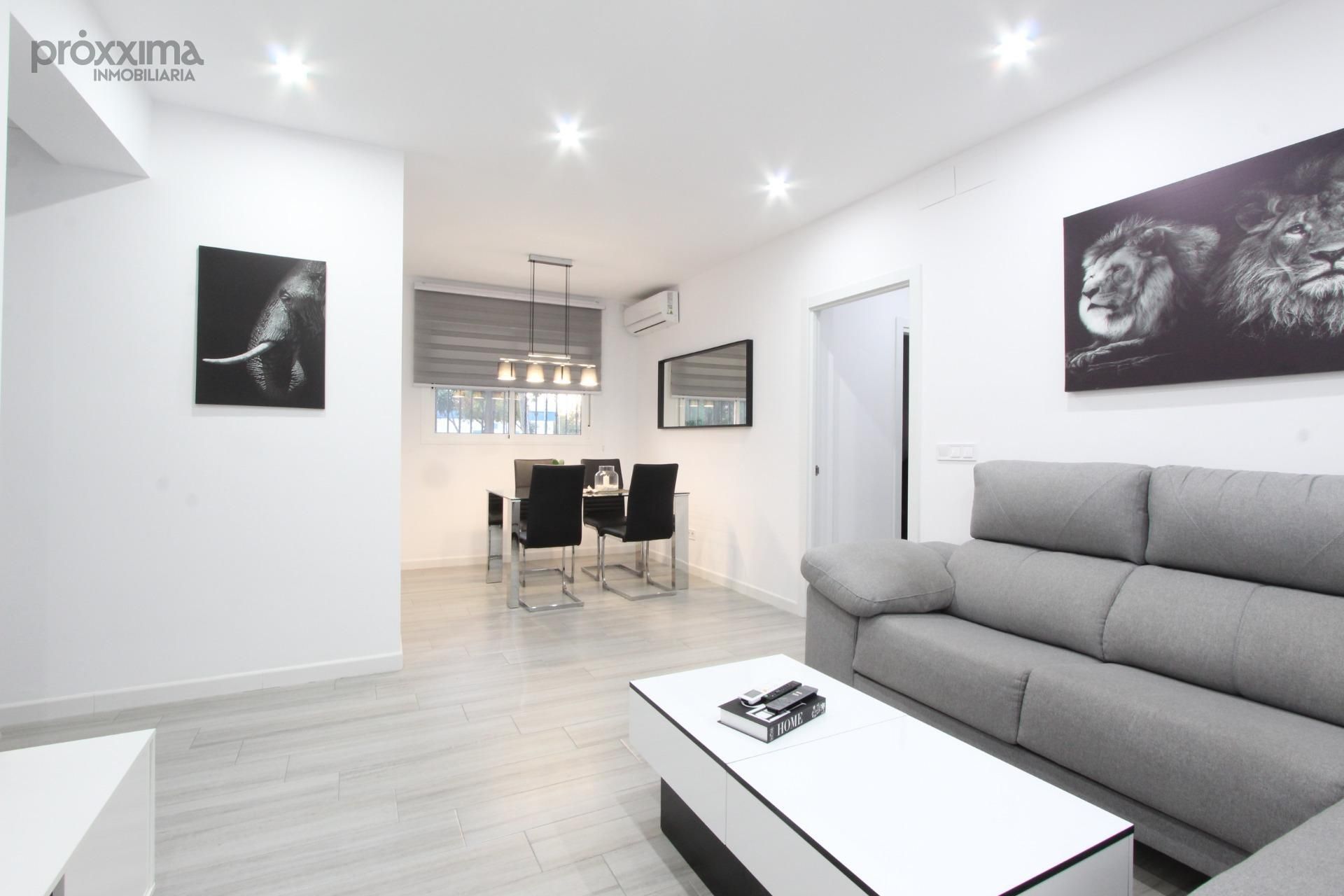 Living room of House or chalet for sale in  Sevilla Capital  with Air Conditioner, Terrace and Storage room