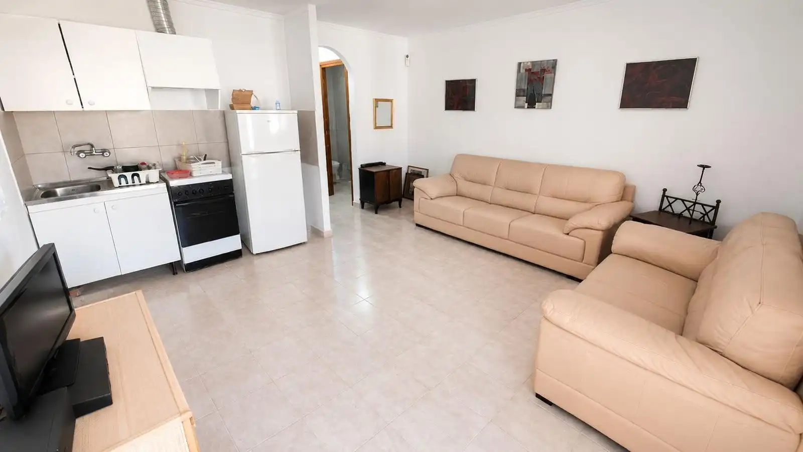 Sala de estar de Casa adosada en venta en Torrevieja con Amueblado, Horno y TV