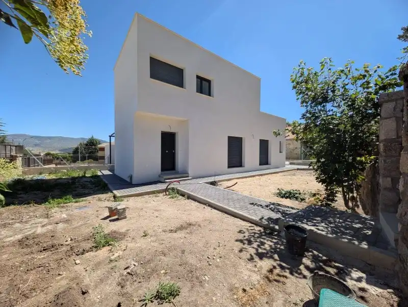 Vista exterior de Casa adosada en venta en El Espinar con Calefacción y Terraza