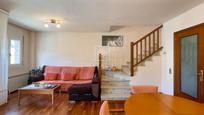 Living room of Single-family semi-detached for sale in Girona Capital  with Air Conditioner, Private garden and Terrace