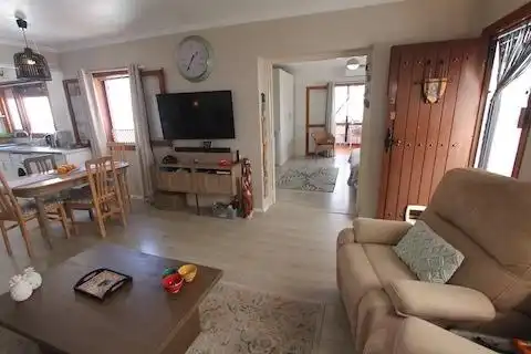 Sala de estar de Piso en venta en Benalmádena con Calefacción, Jardín privado y Terraza