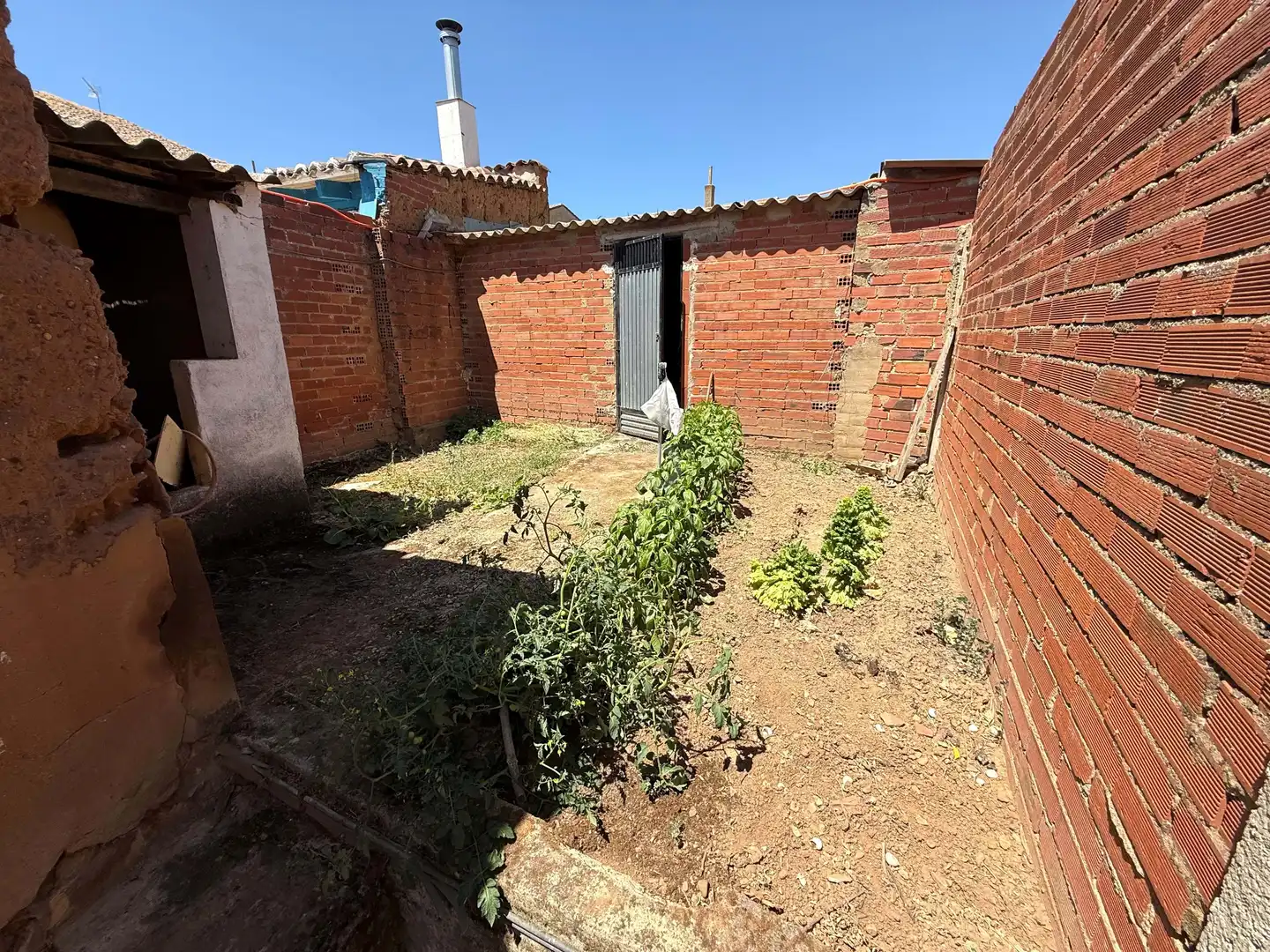 Garten von Einfamilien-Reihenhaus zum Verkauf in Villamañán mit Heizung