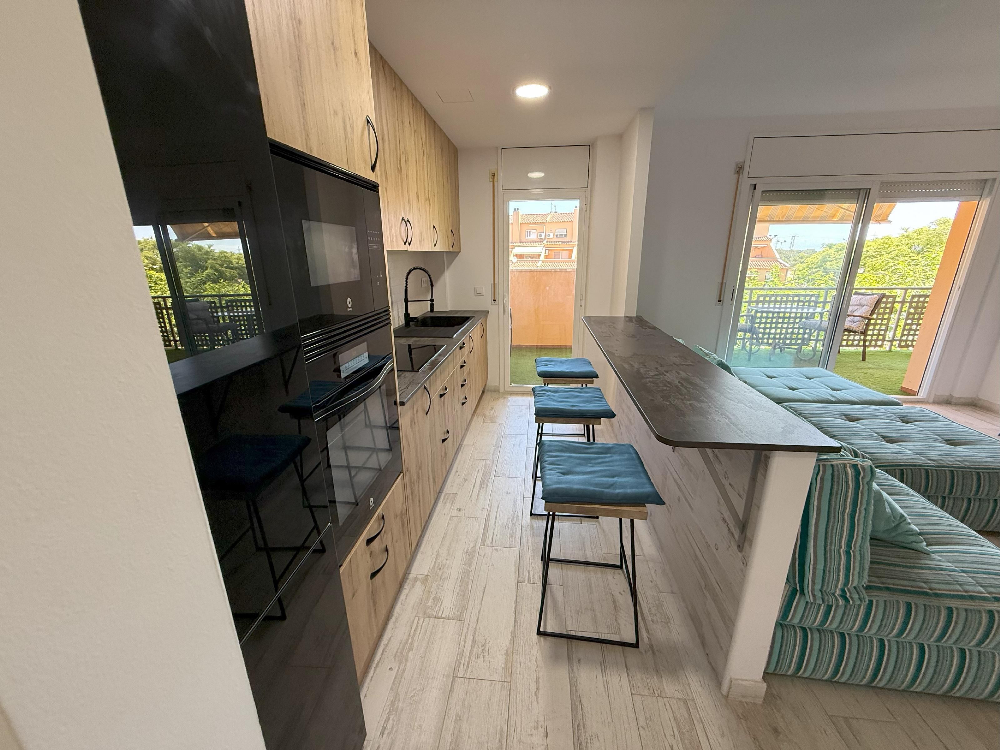 Cuina de Apartament en venda en Roda de Berà amb Jardí privat, Terrassa i Piscina