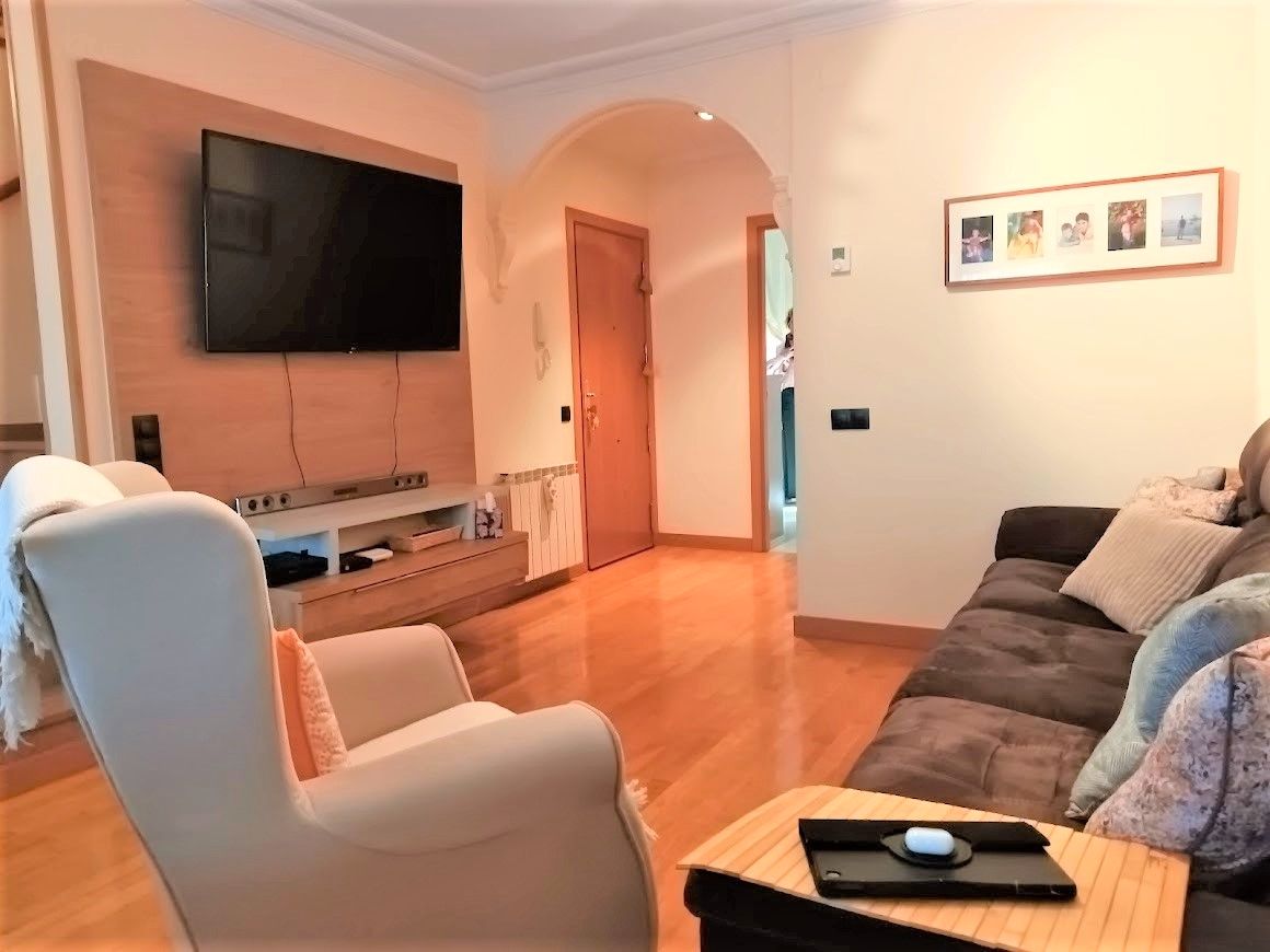 Sala d'estar de Casa adosada en venda en  Lleida Capital amb Aire condicionat, Calefacció i Parquet