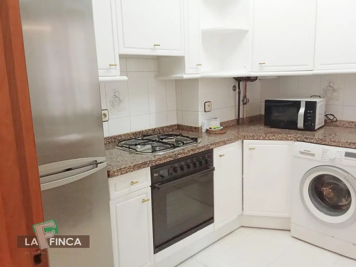 Kitchen of Flat for sale in Oviedo   with Heating, Parquet flooring and Furnished