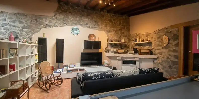Sala d'estar de Casa o xalet en venda en Entrambasaguas amb Jardí privat, Terrassa i Traster