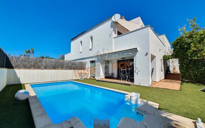 Exterior view of Single-family semi-detached for sale in Calafell  with Air Conditioner, Terrace and Swimming Pool