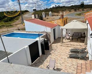 Swimming pool of House or chalet for sale in El Almendro  with Air Conditioner, Heating and Terrace