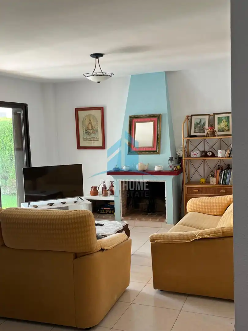 Sala d'estar de Casa adosada en venda en Sueca amb Jardí privat, Terrassa i Traster
