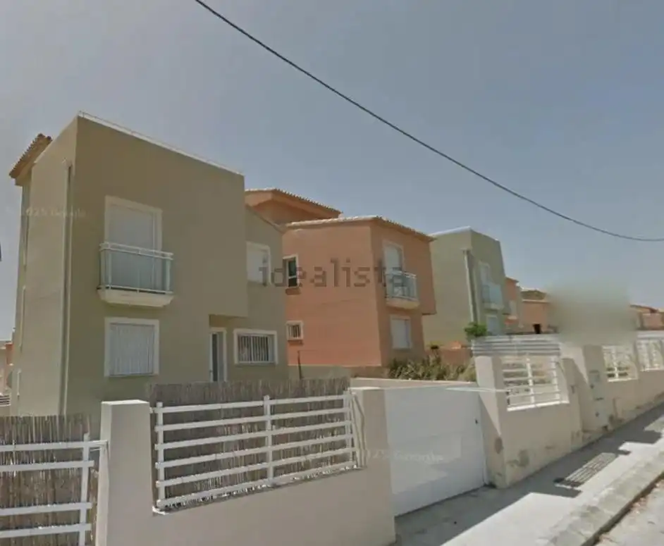 Vista exterior de Casa adosada en venda en L'Alfàs del Pi amb Jardí privat