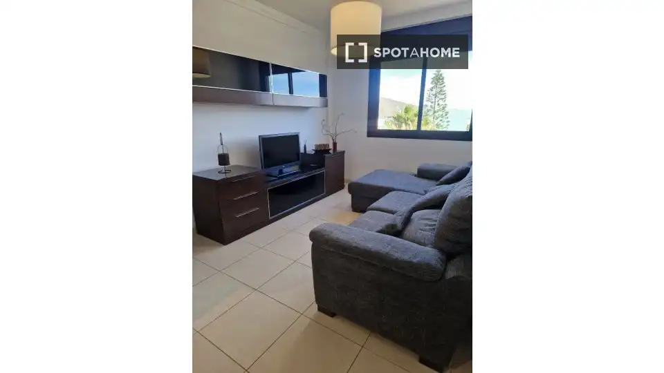 Sala de estar de Apartamento para compartir en San Cristóbal de la Laguna con Aire acondicionado, Terraza y Amueblado