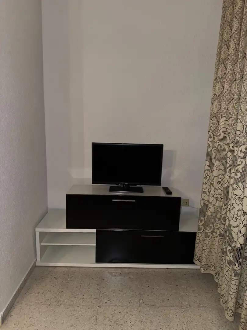 Living room of Flat for share in Granada  with Air Conditioner, Terrace and Furnished