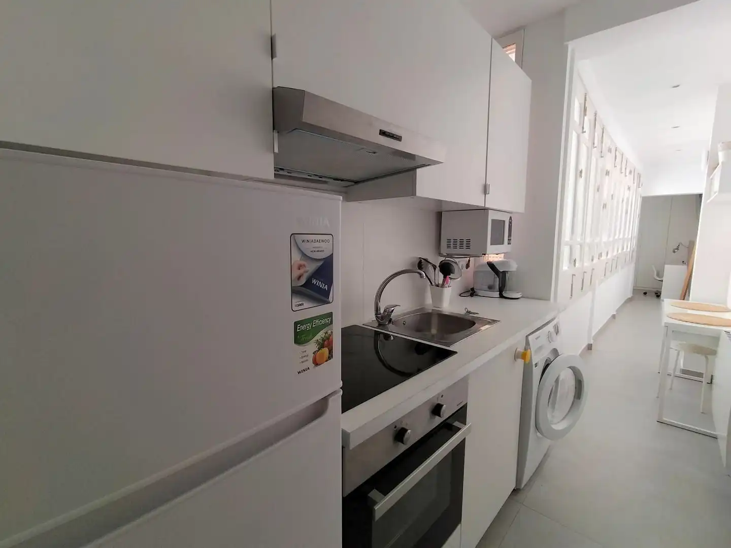 Cuina de Loft de lloguer en Madrid amb Calefacció i Moblat