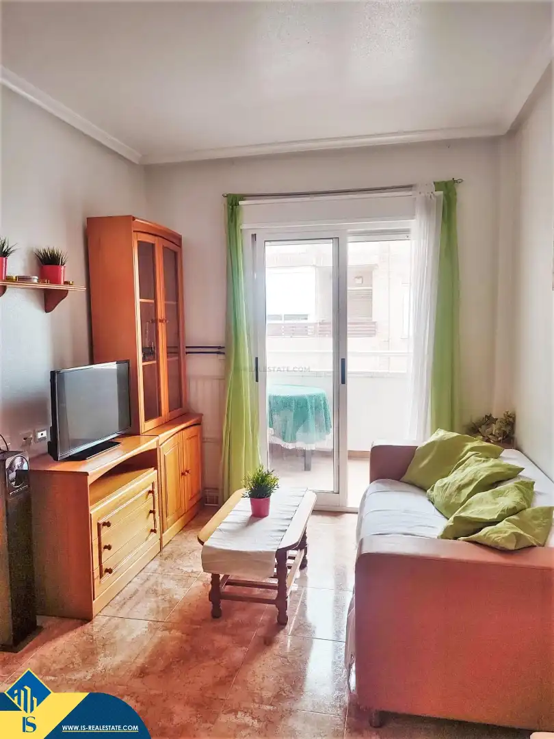 Sala d'estar de Pis de lloguer en Torrevieja amb Aire condicionat, Moblat i Rentadora