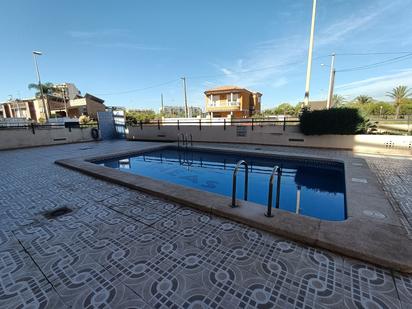 Swimming pool of Single-family semi-detached for sale in Moncofa  with Air Conditioner, Heating and Storage room