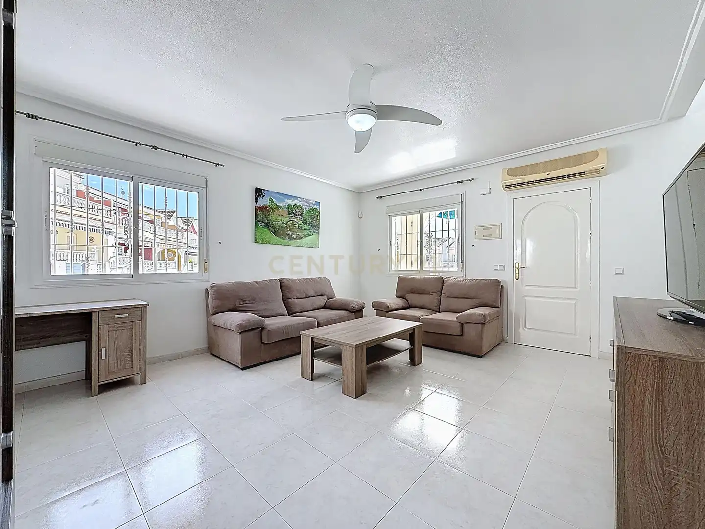 Sala d'estar de Casa adosada en venda en Benijófar amb Aire condicionat i Piscina comunitària