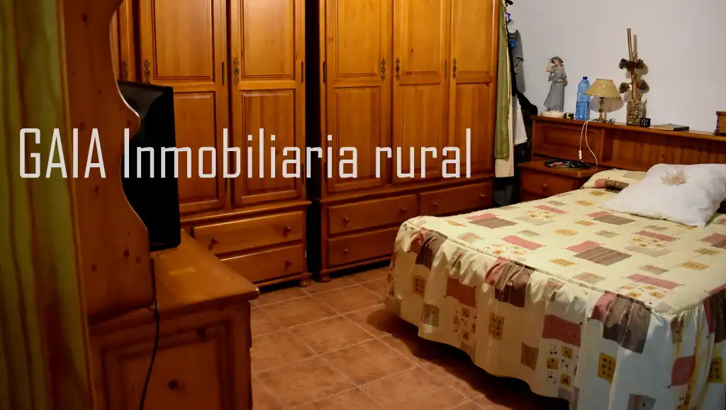 Schlafzimmer von Einfamilien-Reihenhaus zum Verkauf in Caspe