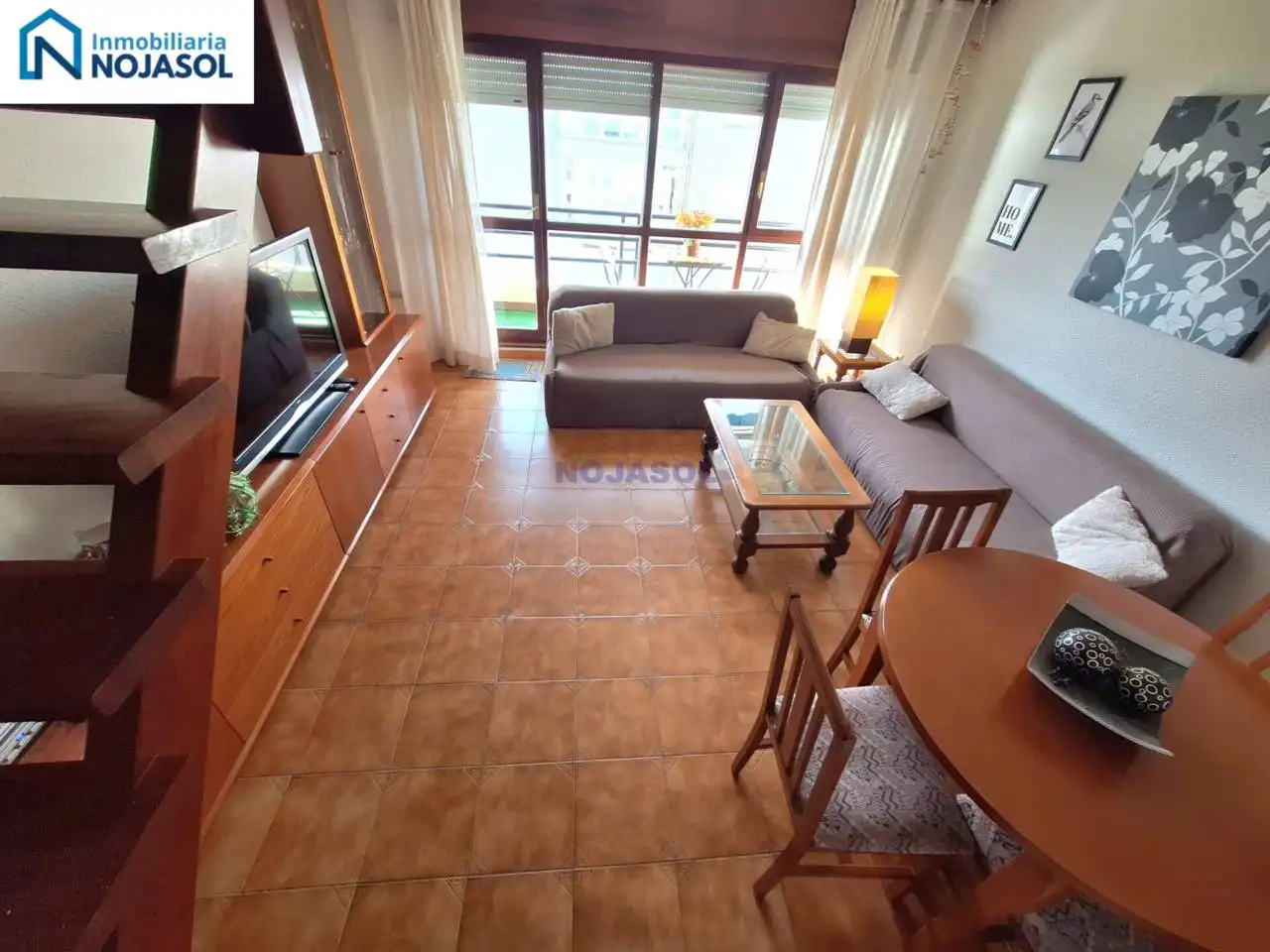 Sala d'estar de Dúplex de lloguer en Noja amb Calefacció, Terrassa i Moblat