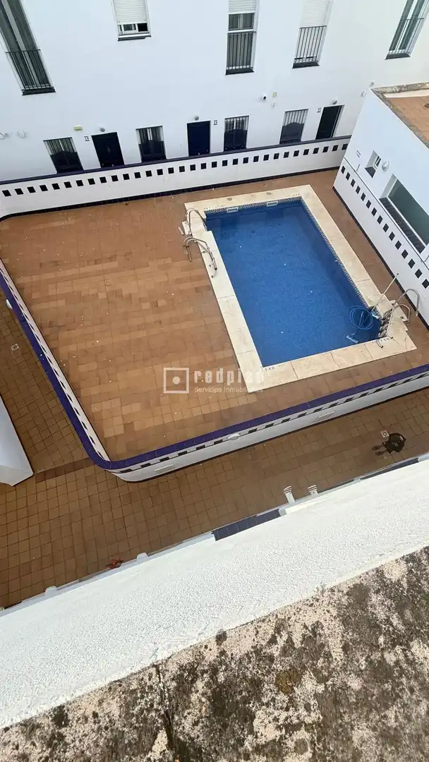 Piscina de Dúplex en venta en Isla Cristina con Calefacción, Terraza y Trastero