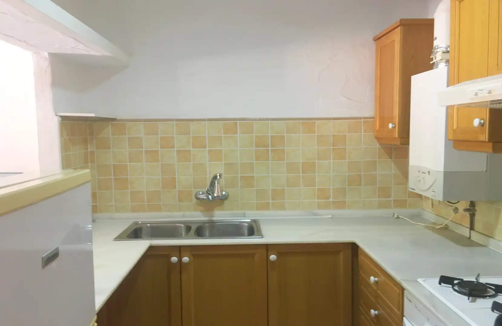 Cuina de Casa adosada en venda en San Agustín amb Calefacció, Jardí privat i Moblat