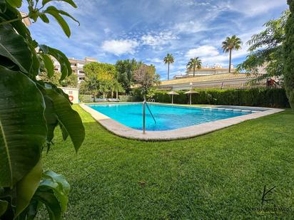 Swimming pool of Flat for sale in L'Alfàs del Pi  with Air Conditioner, Heating and Private garden