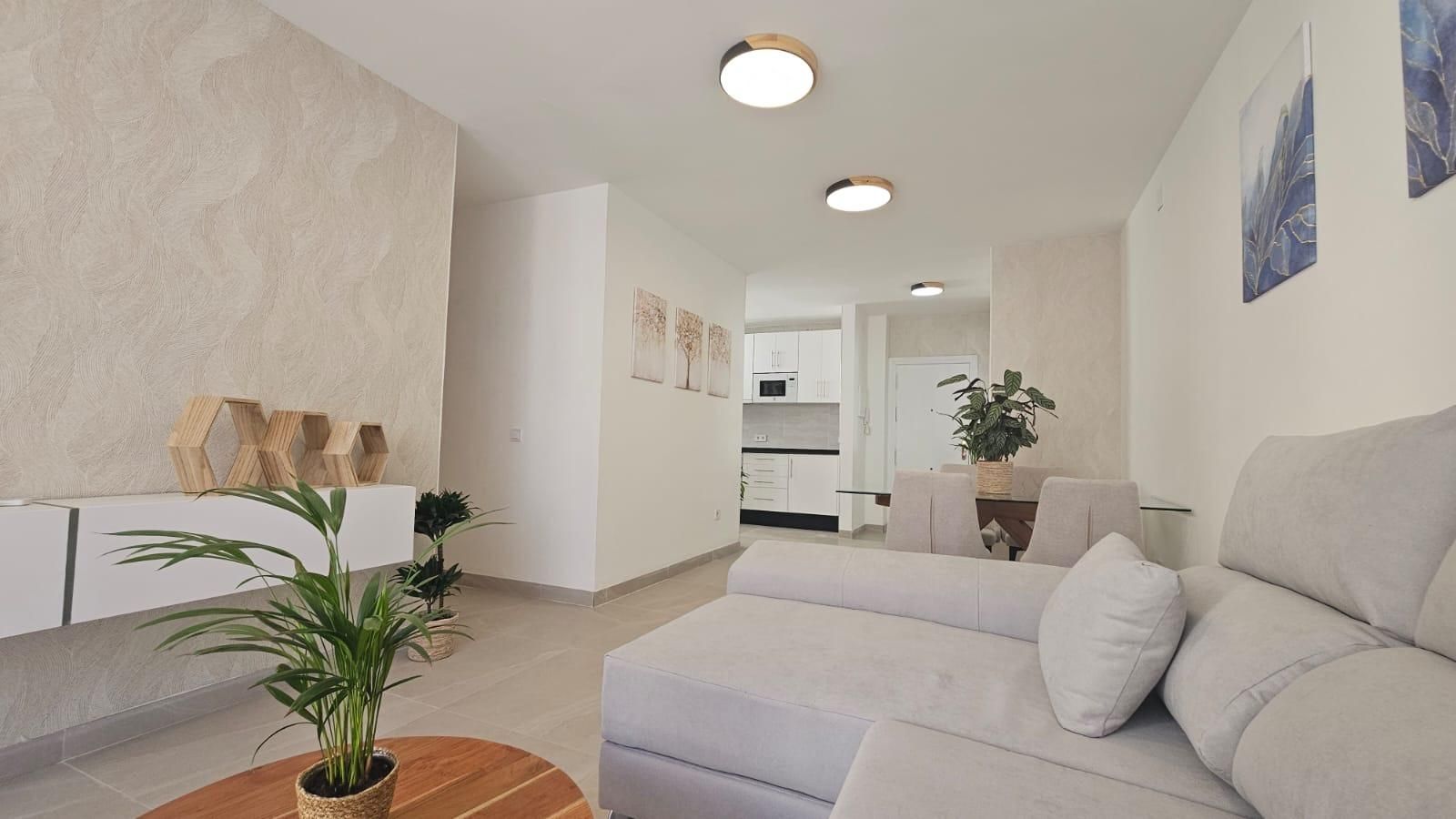 Living room of Flat for sale in Fuengirola  with Air Conditioner, Terrace and Furnished