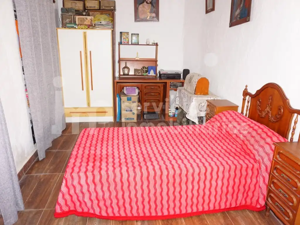 Habitación de Casa adosada en venta en Benamocarra con Jardín privado, Terraza y Amueblado
