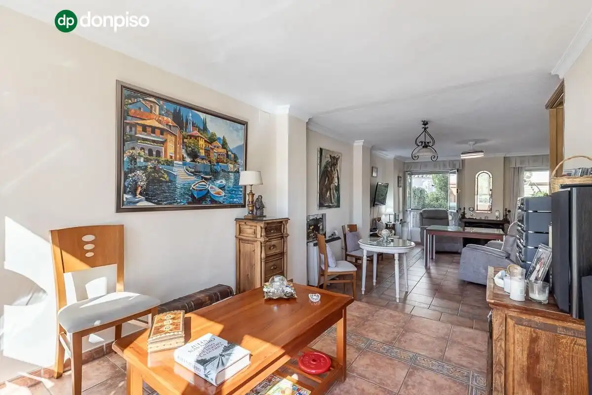 Sala de estar de Casa adosada en venta en Genil