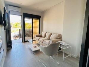 Sala d'estar de Loft de lloguer en  Murcia Capital amb Aire condicionat i Balcó