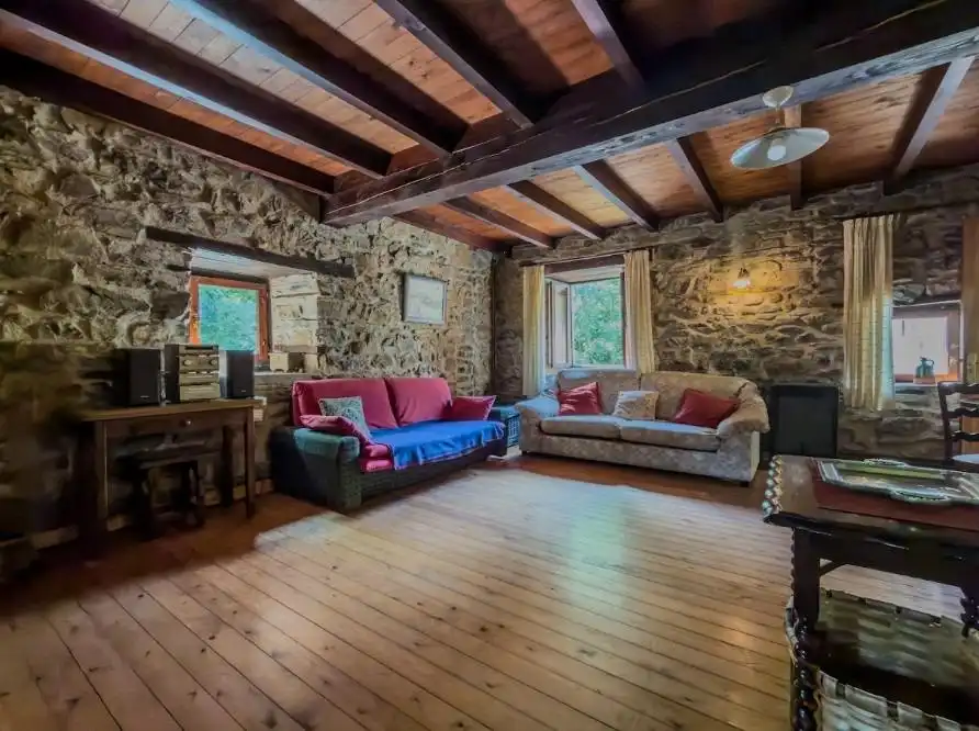 Sala de estar de Casa o chalet en venta en Pesaguero con Calefacción, Terraza y Amueblado