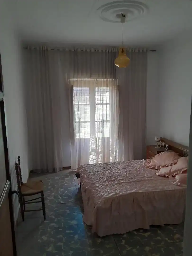 Dormitori de Casa adosada en venda en Arroyo del Ojanco amb Balcó