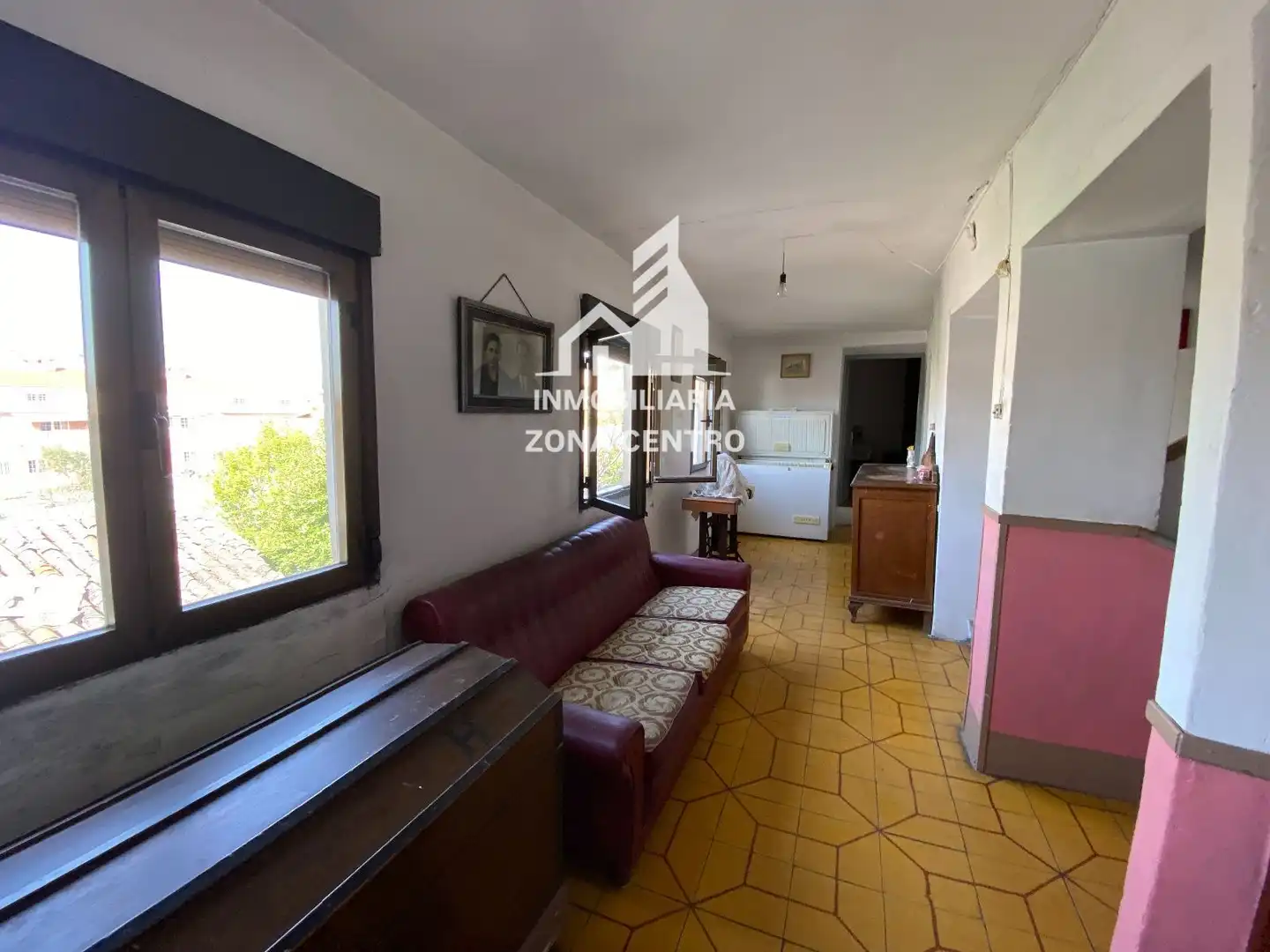 Sala de estar de Casa adosada en venta en Baltanás con Calefacción, Jardín privado y Amueblado