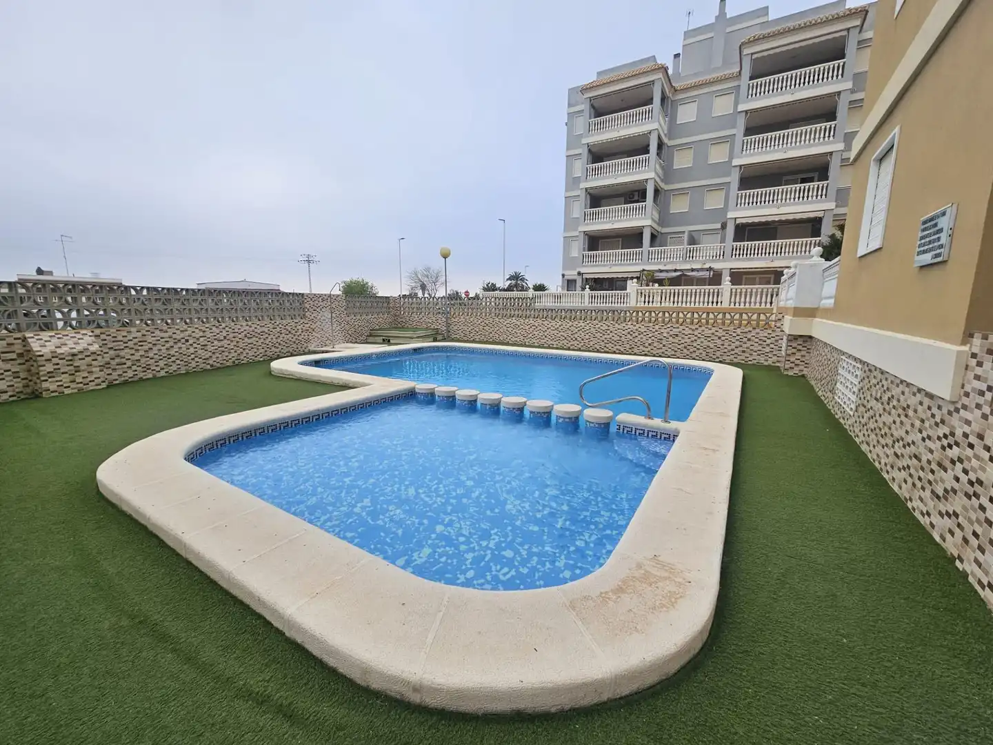 Swimming pool of Flat for sale in Sueca  with Air Conditioner, Heating and Storage room