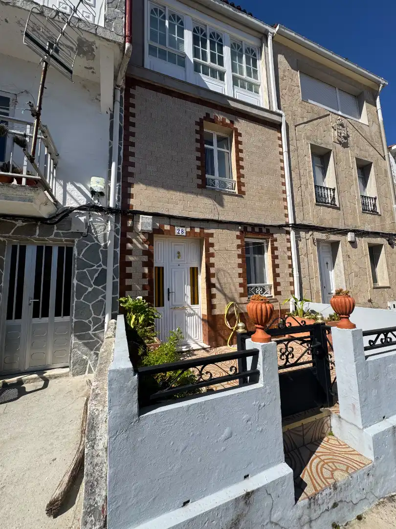 Vista exterior de Casa adosada en venta en Muros con Amueblado