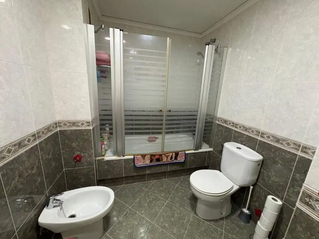 Bany de Casa adosada en venda en Sagunto / Sagunt amb Aire condicionat, Calefacció i Terrassa