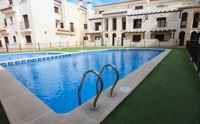 Swimming pool of Duplex for sale in San Pedro del Pinatar  with Air Conditioner, Terrace and Storage room